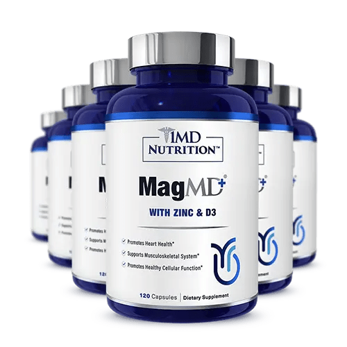 Six navy blue bottles of 1MD Nutrition MagMD Plus with Zinc and D3, 120 capsules each, arranged in a cluster